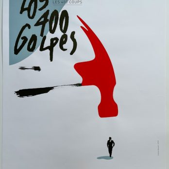 A striking red hammer-shaped graphic above a solitary figure, evoking themes of rebellion and authority.